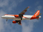 G-EZTY @ LEBL - Landing rwy 24 in new c/s - by Shunn311