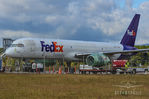 N977FD @ KCHA - Sitting at the FedEx facility at Chattanooga Airport after a crash landing a few days before due to hydraulic failure. The 757 has been returned to its feet. Engines wrapped in plastic. It awaits its fate. - by Aerowephile