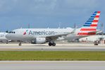 N9002U @ KMIA - AA A319 taxying for departure - by FerryPNL