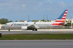 N306SW @ KMIA - American B738 Max taxying to runway 01L - by FerryPNL