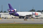 N589FE @ KMIA - Fedex MD11F departing MIA - by FerryPNL