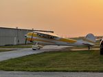 N195AB @ KDVN - pulling the 195 out of T hangars - by Floyd Taber