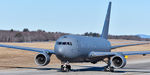 15-46010 @ KPSM - ROMA11, from the 305th AMW  out of McGuire with no markings besides an American Flag. - by Topgunphotography