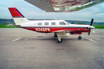 N246PR @ LSZG - Below the wing of the DC-3 at Grenchen. Scanned from a slide. - by sparrow9