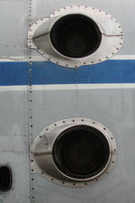 UR-09307 @ LOWW - Air exhausts on the right side above the gear bulges