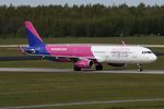 HA-LXO @ EHEH - Wizz Air A321 taxying to its parking spot - by FerryPNL