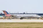 N464AW @ KORD - CRJ2 Air Wisconsin/ American Eagle BOMBARDIER INC CL-600-2B19 N464AW AWI6077 LSE-ORD - by Mark Kalfas