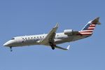 N470ZW @ KORD - CRJ2 Air Wisconsin/American Eagle Canadair Regional Jet CRJ-200 N470ZW N470ZW AWI6017 SPI-ORD, landing on 28C ORD - by Mark Kalfas