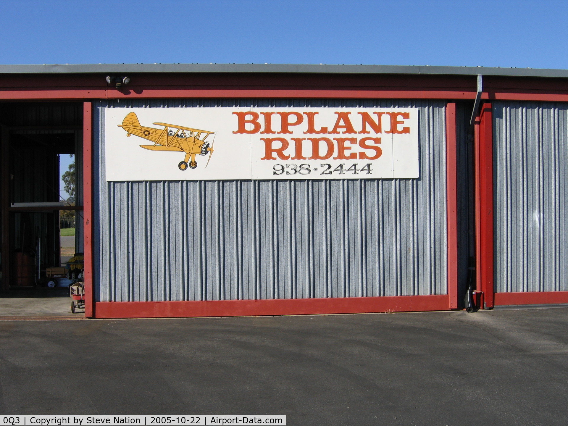 Sonoma Valley Airport (0Q3) - Biplane Rides hangar and sign at Sonoma Valley Airport, Schellville, CA (operator has three PT-17 Stearmans)