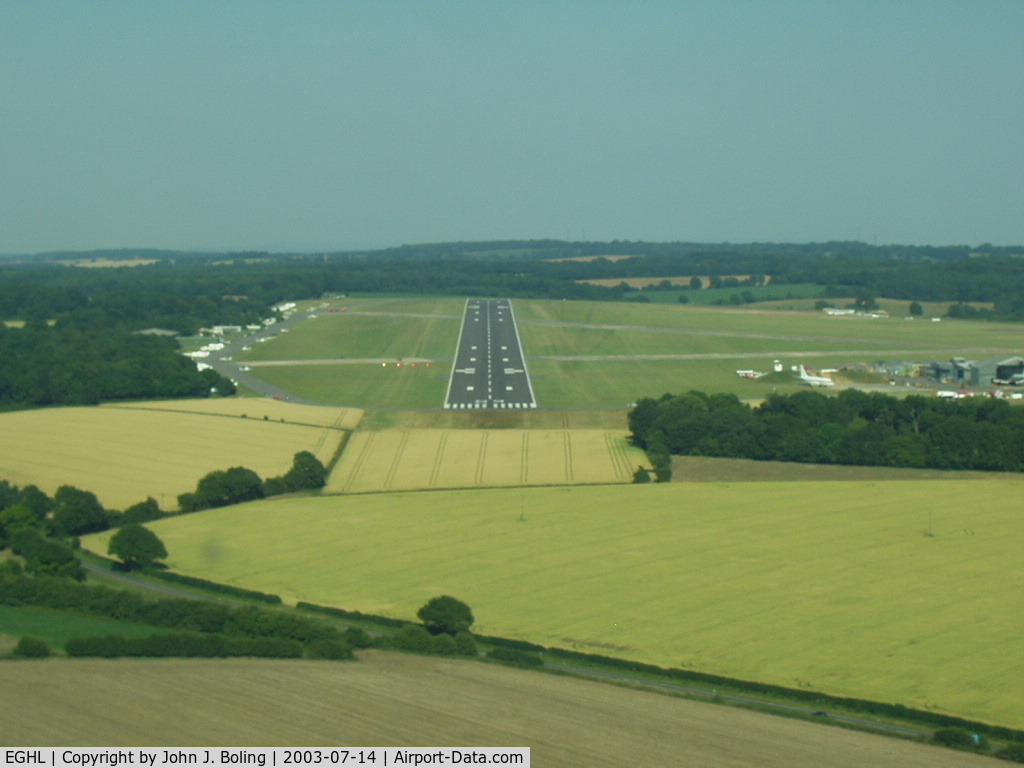 Lasham Airfield Airport, Basingstoke, England United Kingdom (EGHL) - Lasham England. Glider field. Large aircraft maint facility on sw corner of field (right side of photo) Capt Bruce Burns and Capt john Boling delivered two 757s for maint in 2003
