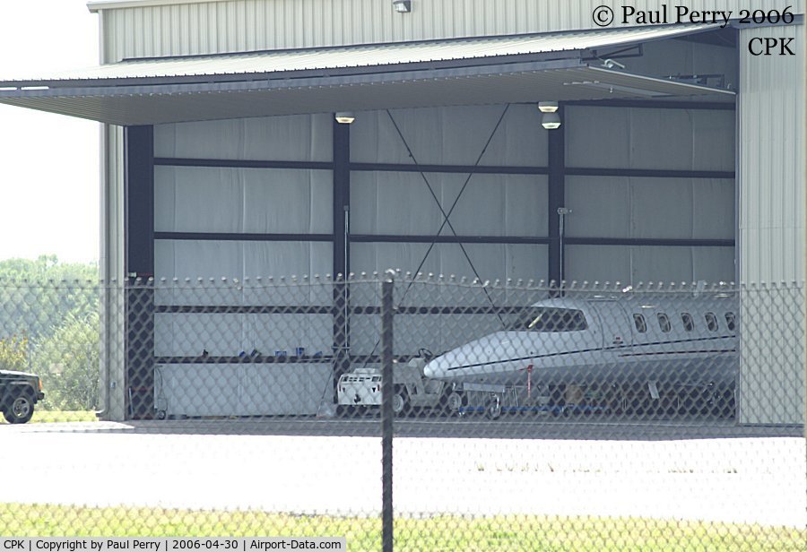 Chesapeake Regional Airport (CPK) - Biz-Jet poking her nose out of the hangar a bit