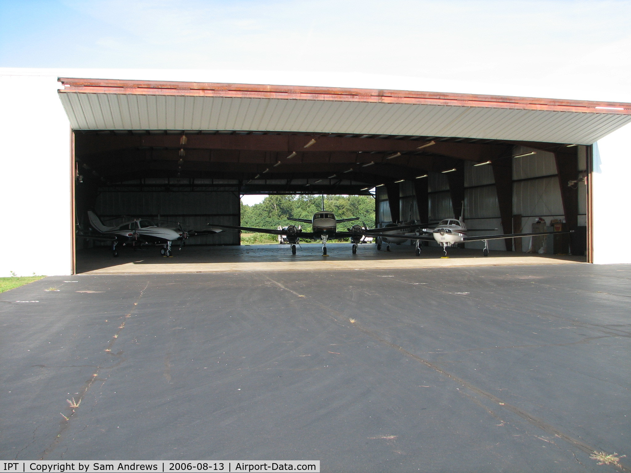 Williamsport Regional Airport (IPT) - The other GA hangar at Degol.  l to r; N169DK, N999SE, N818JP