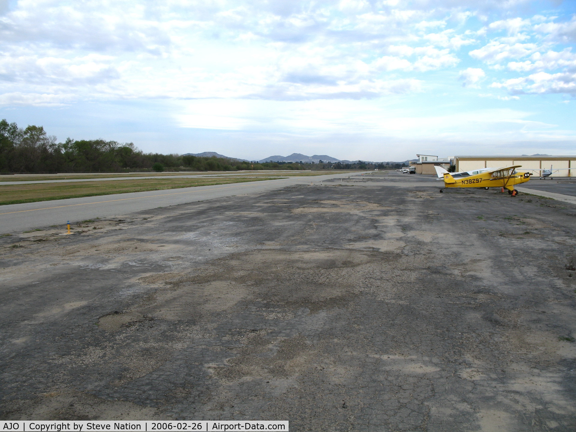 Corona Municipal Airport (AJO) - Looking northeast down ramp and Runway 07/25 @ Corona Municipal Airport, CA