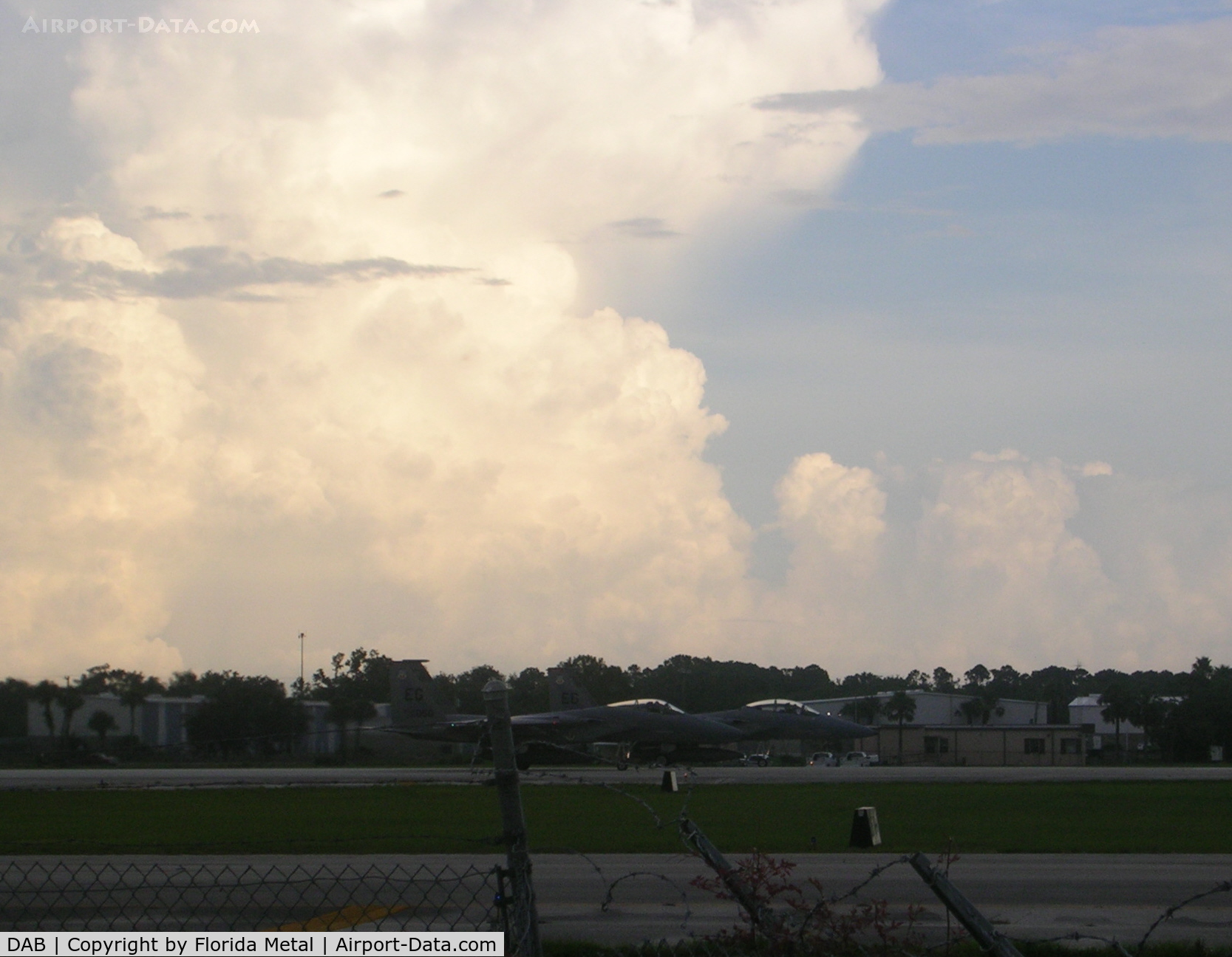 Daytona Beach International Airport (DAB) - F-15s line up with towering storm clouds in background