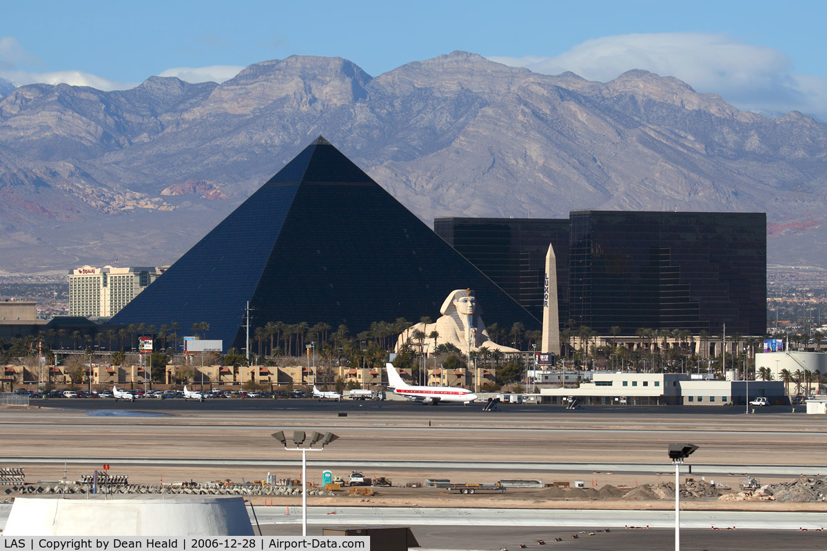 Mc Carran International Airport (LAS) - Looking west from the airport's main parking structure, you get a nice view of the Luxor Hotel & Casino and the mountains.