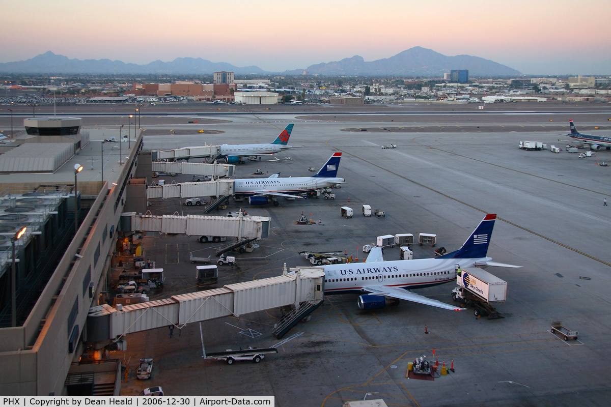 Phoenix Sky Harbor International Airport (PHX) - US Airways / America West aircraft gated at Terminal 4 late in the day.
