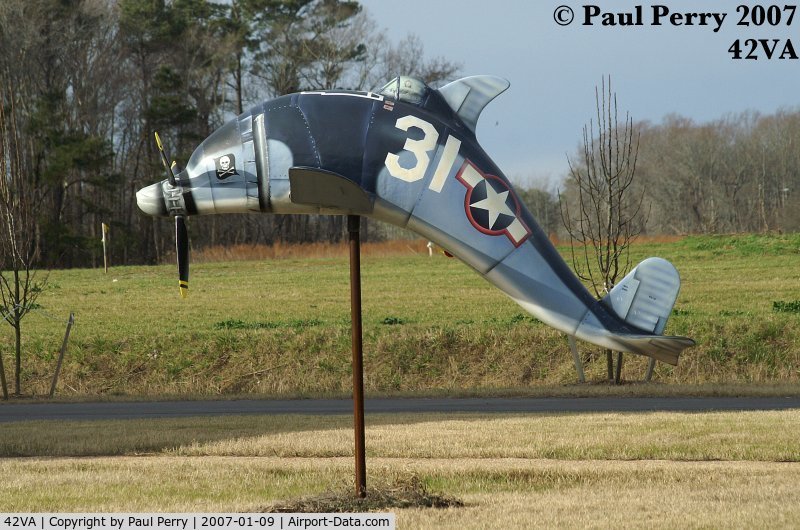 Virginia Beach Airport (42VA) - Decorative dolphin dressed as the Fighter Factory's FG-1D