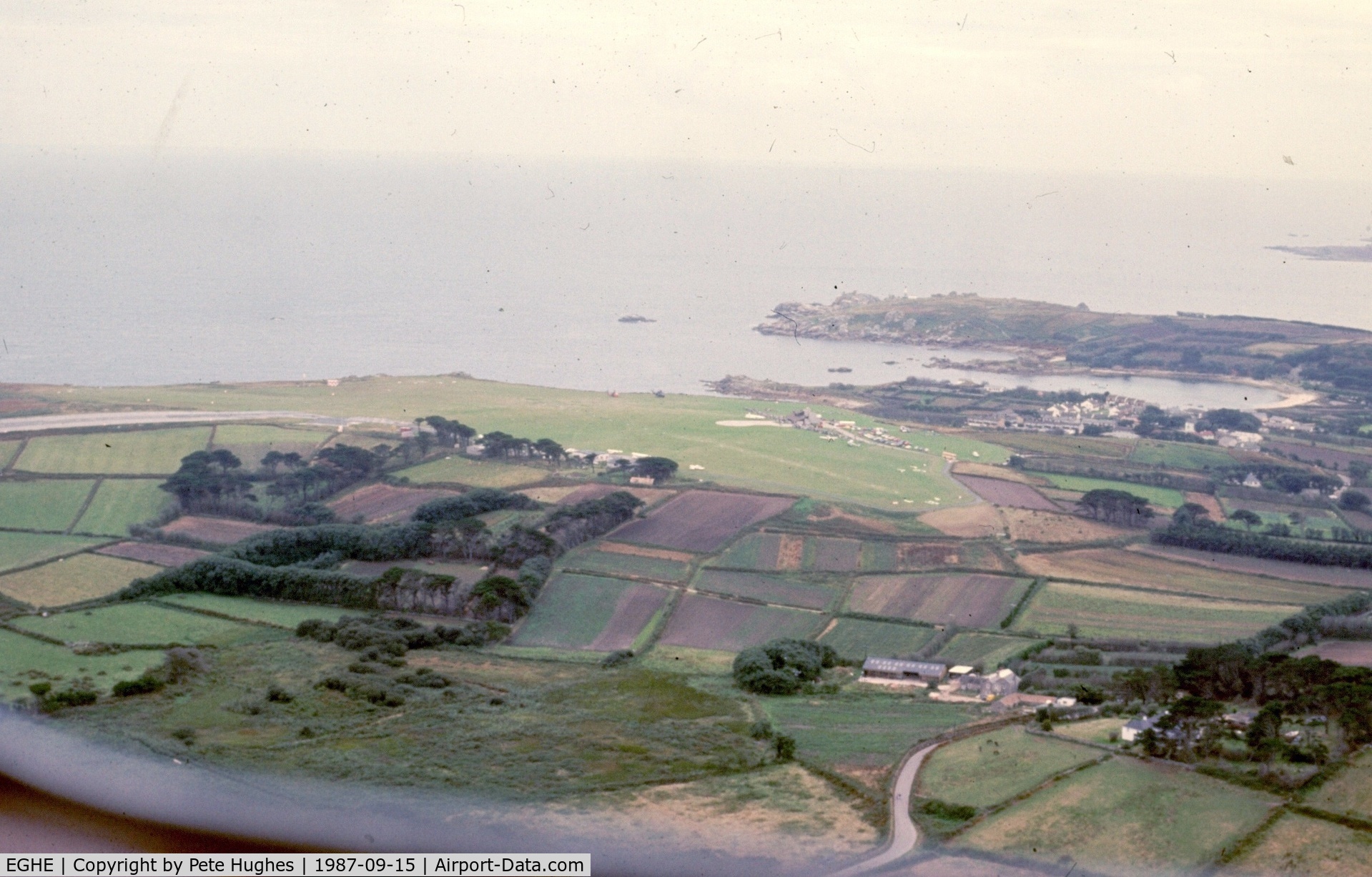 St. Mary's Airport, St. Mary's, England United Kingdom (EGHE) - St Mary's Isles of Scilly seen from DH84 Dragon EI-ABI