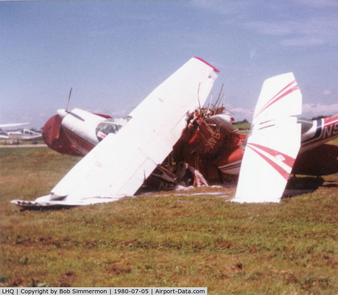 Fairfield County Airport (LHQ) - Tornado damage. Ball of planes - foamed down and No Smoking signs in place