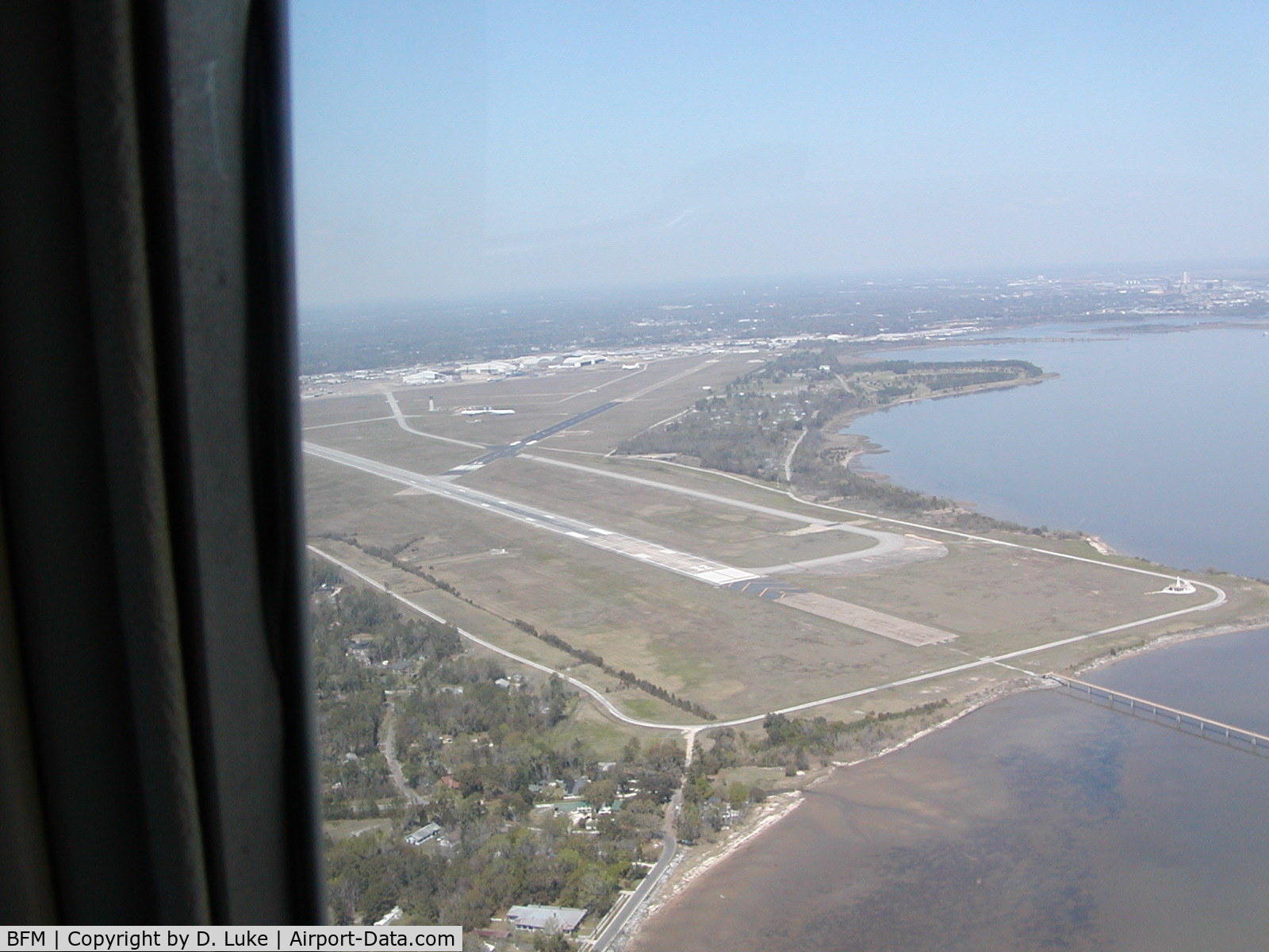 Mobile Downtown Airport (BFM) - Entering right downwind, RWY 14.  Mobile Bay at right.