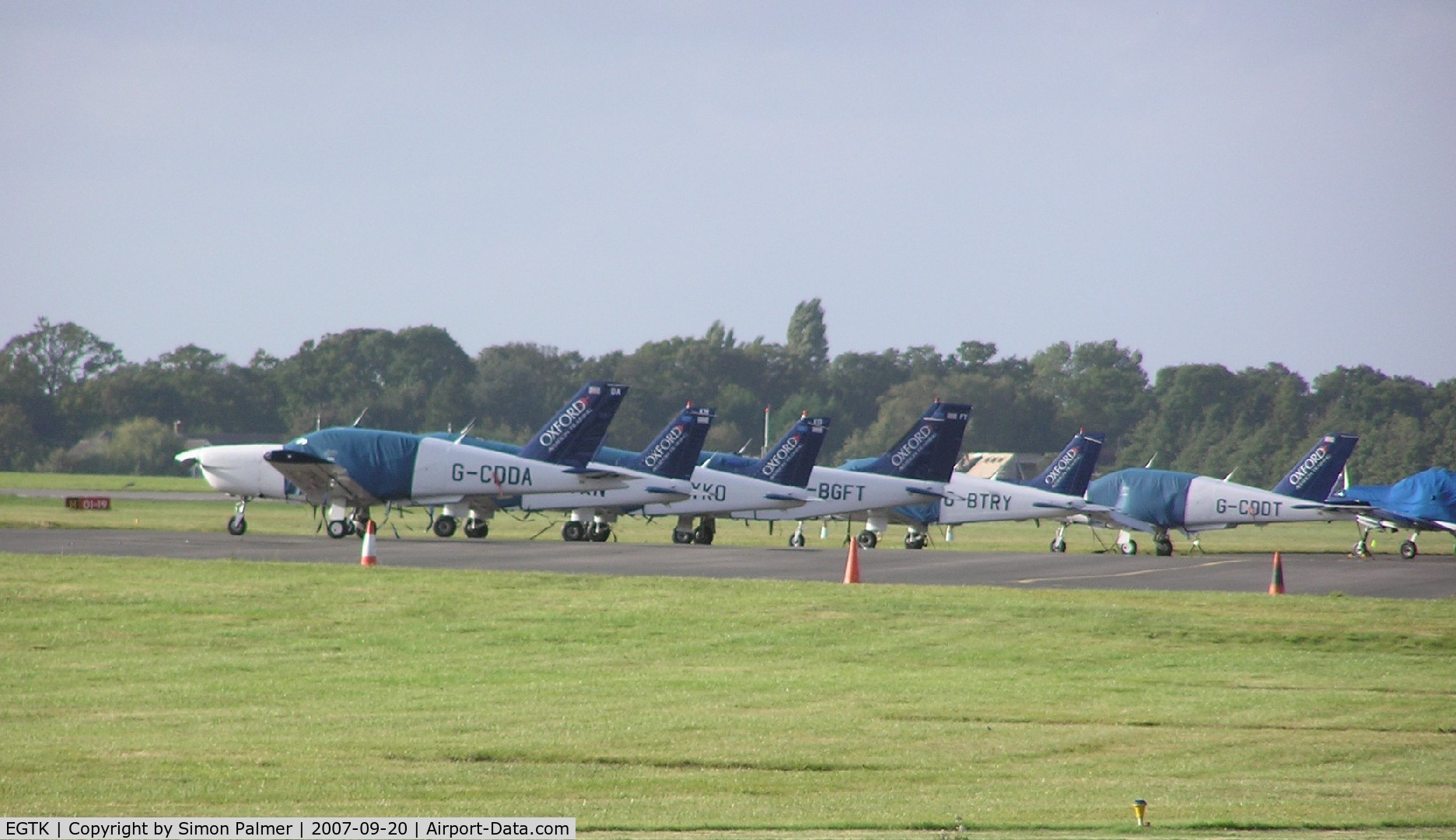 Oxford Airport, Oxford, England United Kingdom (EGTK) - Distant view of Oxford Air Training fleet