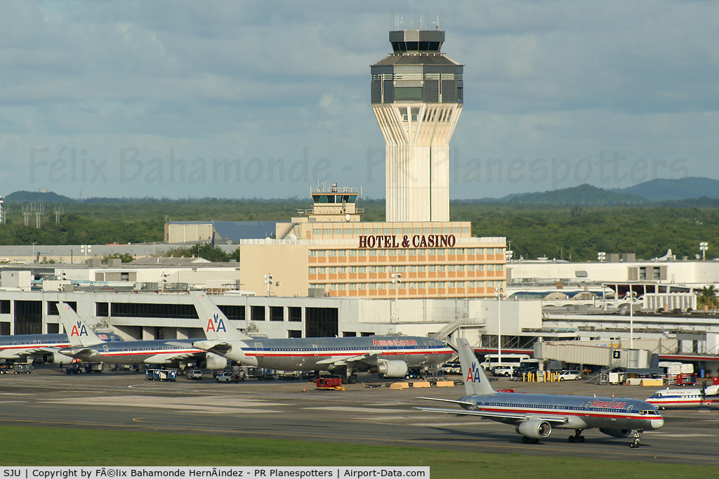Luis Munoz Marin International Airport (SJU) - Overview of SJU, here is visible the north-side terminal of American Airlines and also the new and old tower.