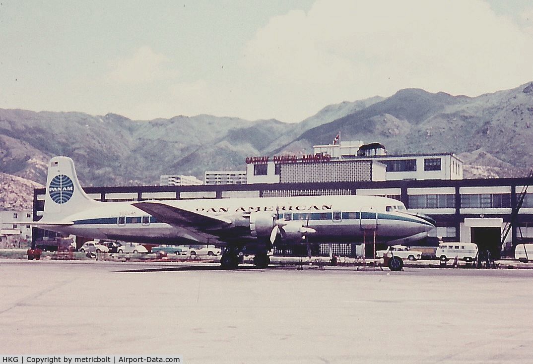 Hong Kong International Airport, Hong Kong Hong Kong (HKG) - PAA DC-6 used for US personnel in Vietnam R&R outside the PAA maintenance building in 1967