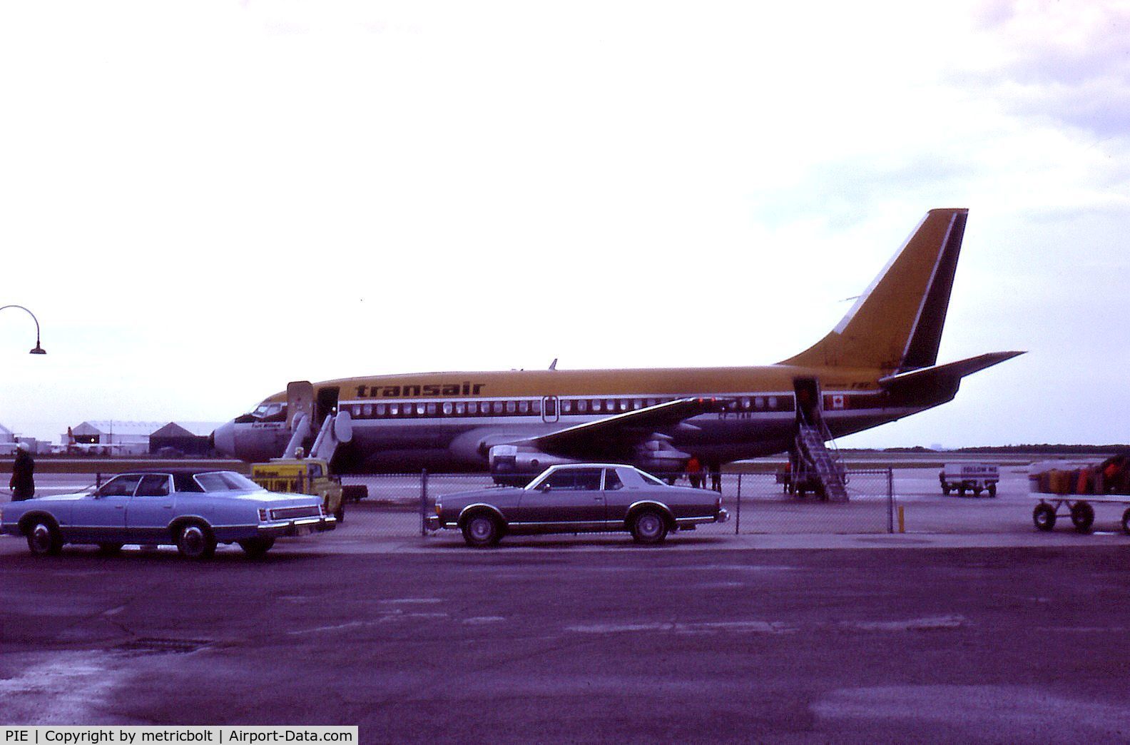 St Petersburg-clearwater International Airport (PIE) - Transair B737 CF-TAN early morning departure,June 1977