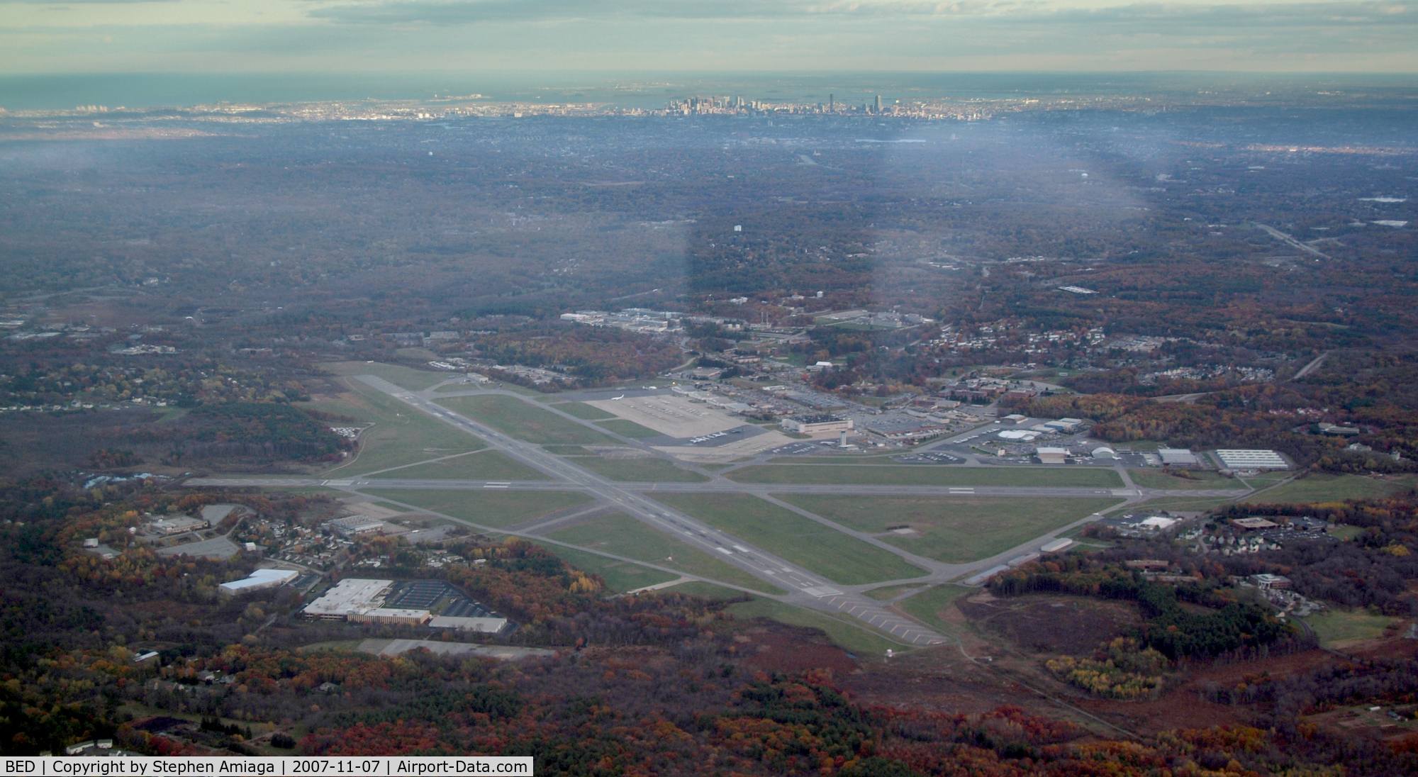 Laurence G Hanscom Fld Airport (BED) - Hanscom fm the W at 3000 MSL, Boston in distance