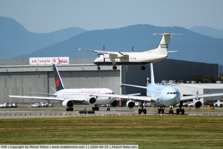 Vancouver International Airport, Vancouver, British Columbia Canada (YVR) - DHC-8 landing while one 767 and one A340 are waiting for take-off