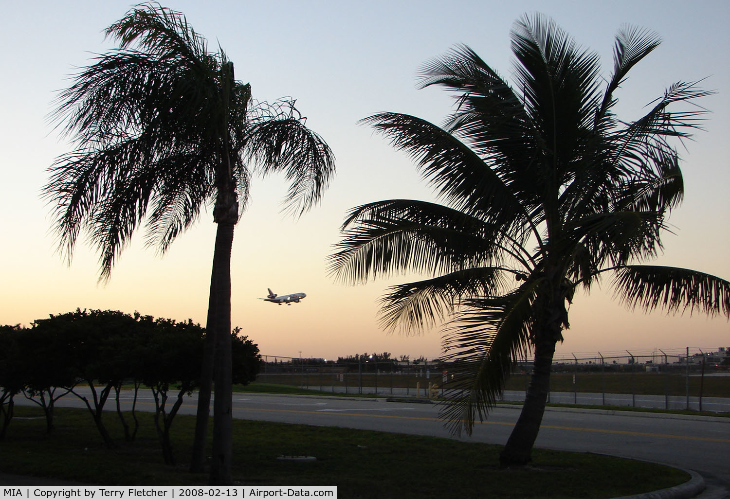Miami International Airport (MIA) - All the photographers have gone from the fence , as a FedEX DC10 arrives MIA just before nightfall