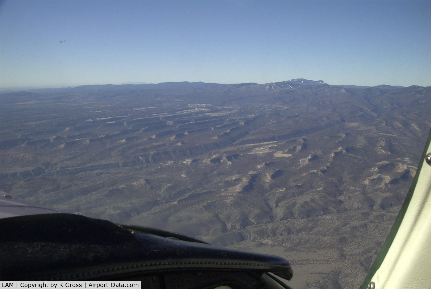 Los Alamos Airport (LAM) - Southbound over the valley looking to the west