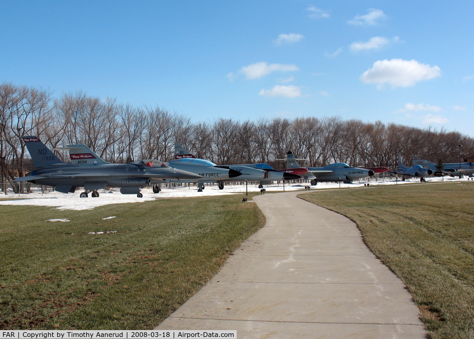Hector International Airport (FAR) - North Dakota Air National Guard display area. F-16, F-101, F-102, F-94, F-89, F-4. Not visible is a P-51, and another F-4