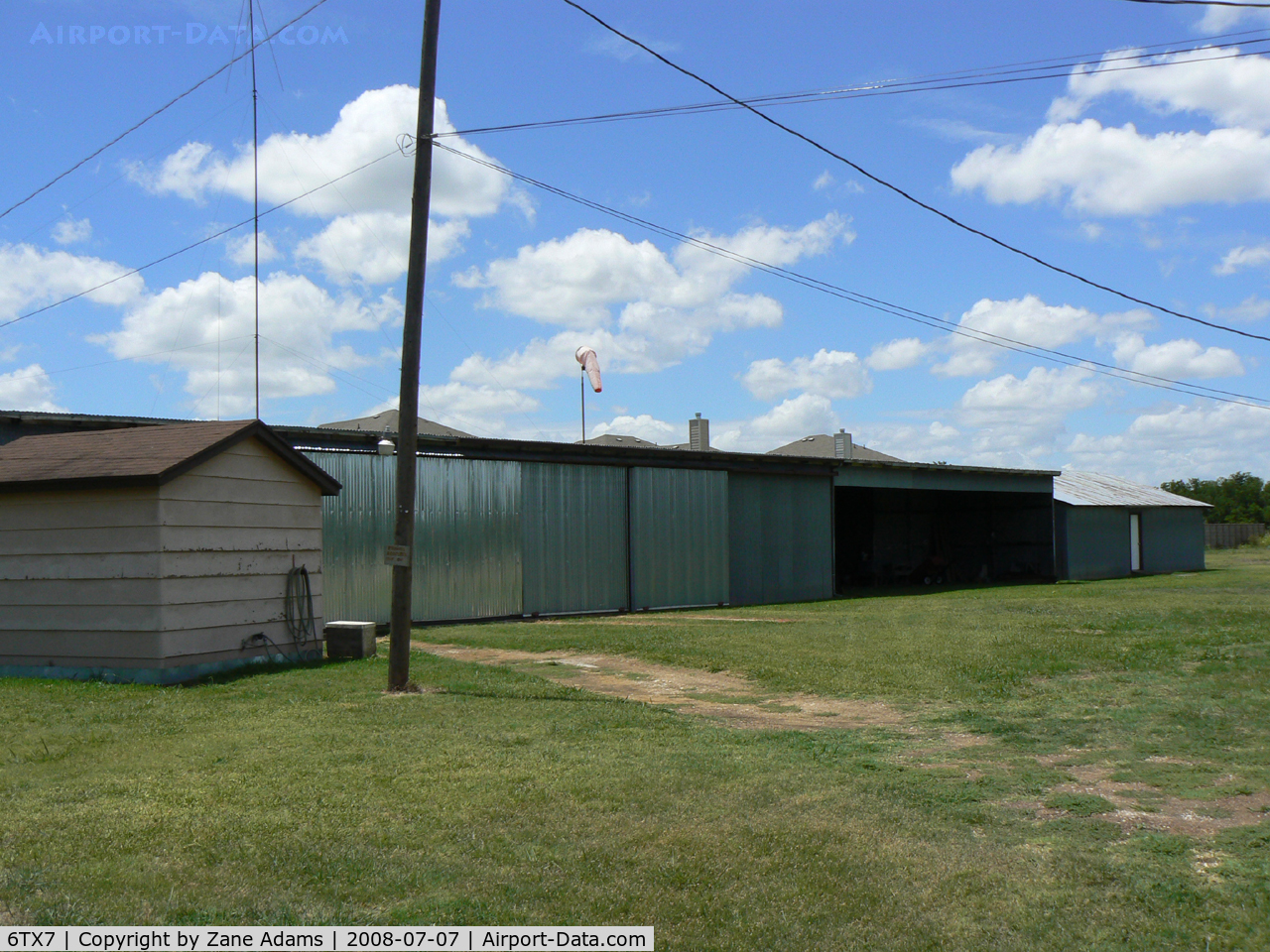 Flying L Airpark Airport (6TX7) - Flying L Private Strip - Unsure weather this airfield is still open. There is a fence and new subdivision of houses built with in yards of the hanger building, there was no airplane in the hanger and I could not see the runway