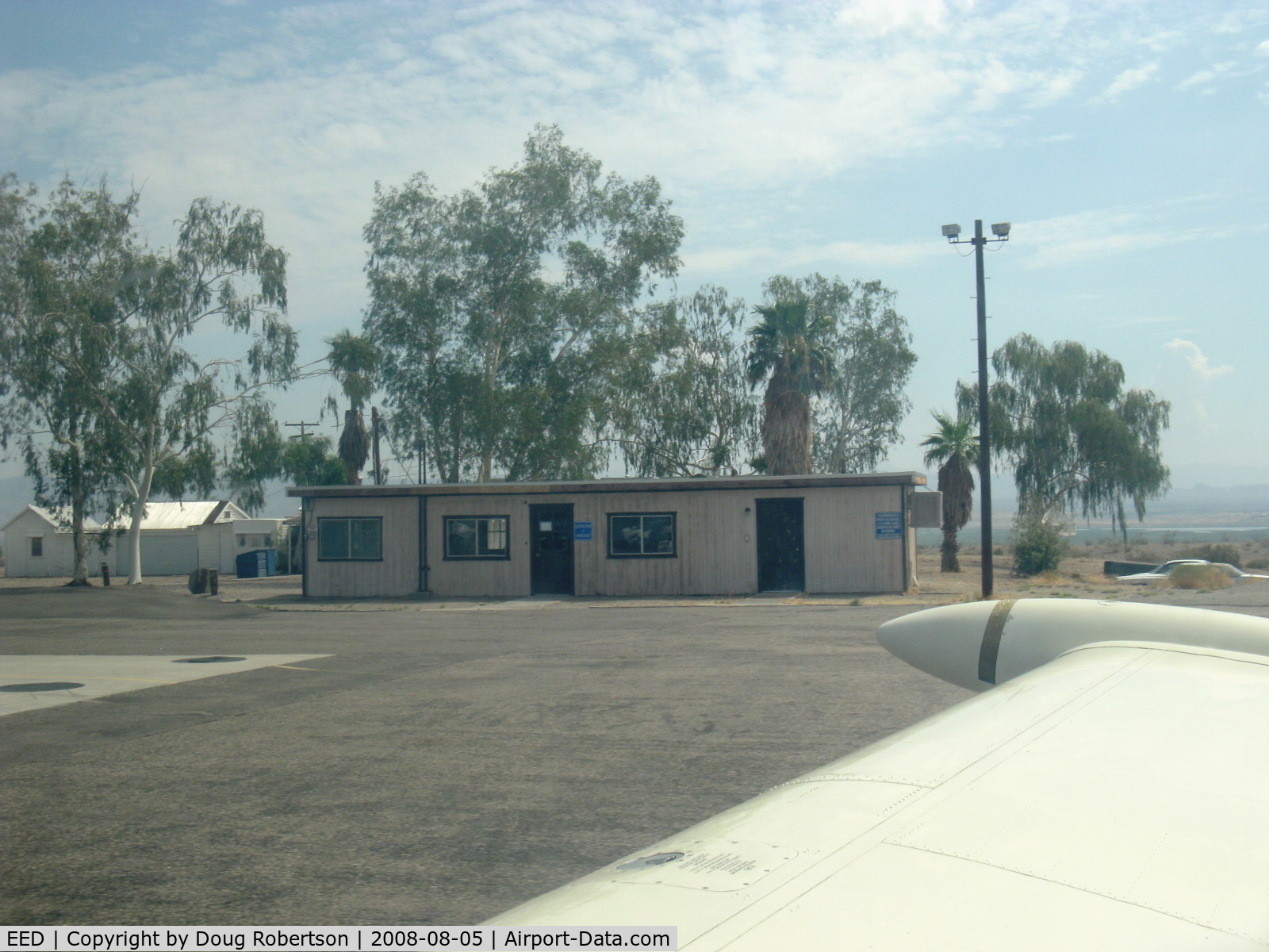 Needles Airport (EED) - Terminal Bldg. Phone to Riverside FSS, toilets and flight-planning tables