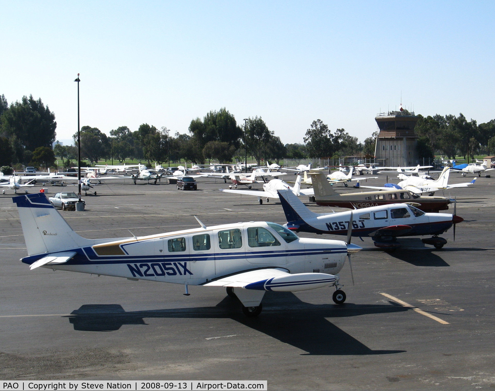 Palo Alto Arpt Of Santa Clara Co Airport (PAO) - N2051X/N3946J/N39944 running-up engines while tower lets stream of Cessnas come home