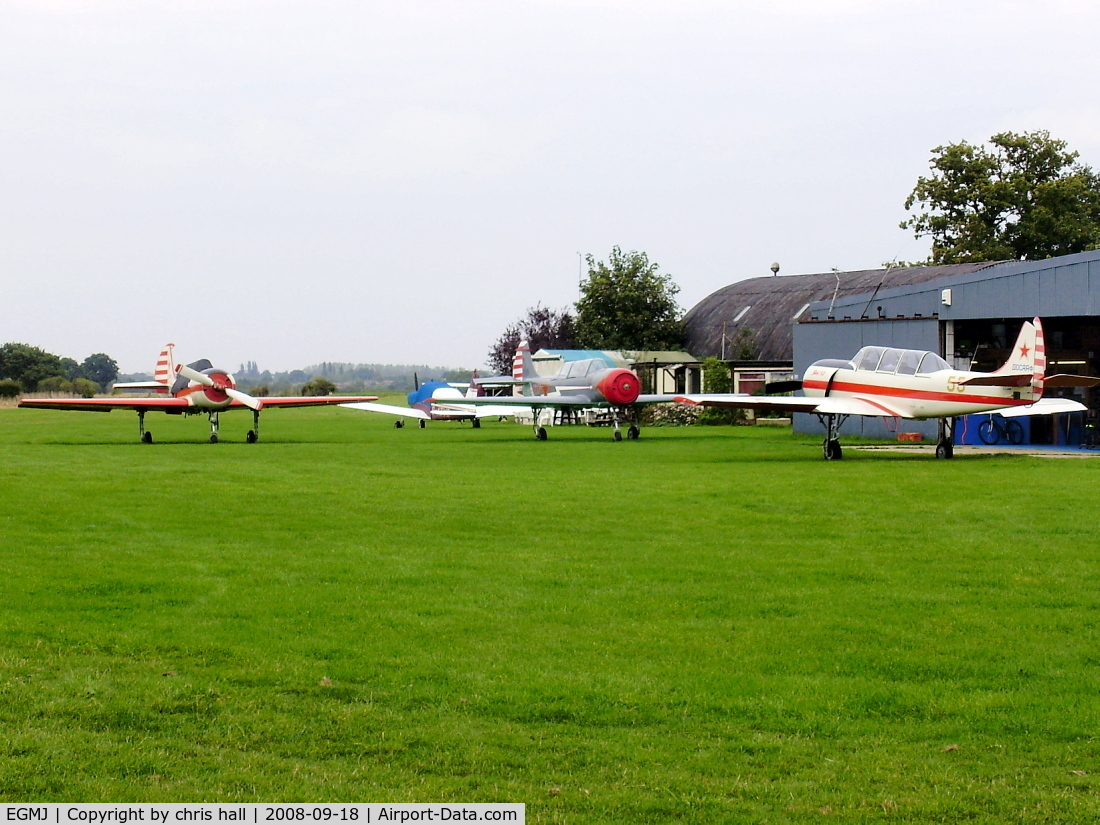 Little Gransden Airfield Airport, St Neots, England United Kingdom (EGMJ) - lots of Yak's. from left to right, RA-02209, G-CCCP, G-BVOK