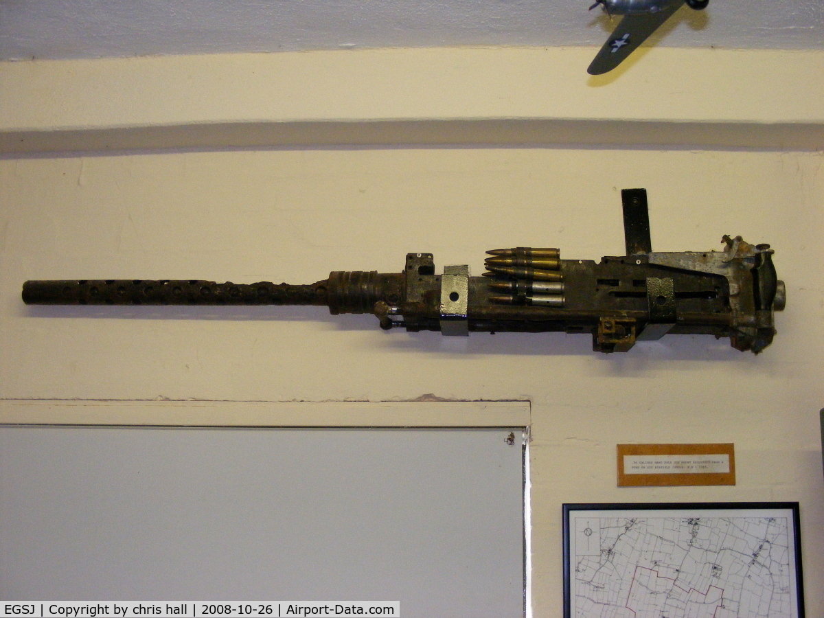 Seething Airfield Airport, Norwich, England United Kingdom (EGSJ) - 50 Cal. machine gun in the Seething airfield Control Tower Museum