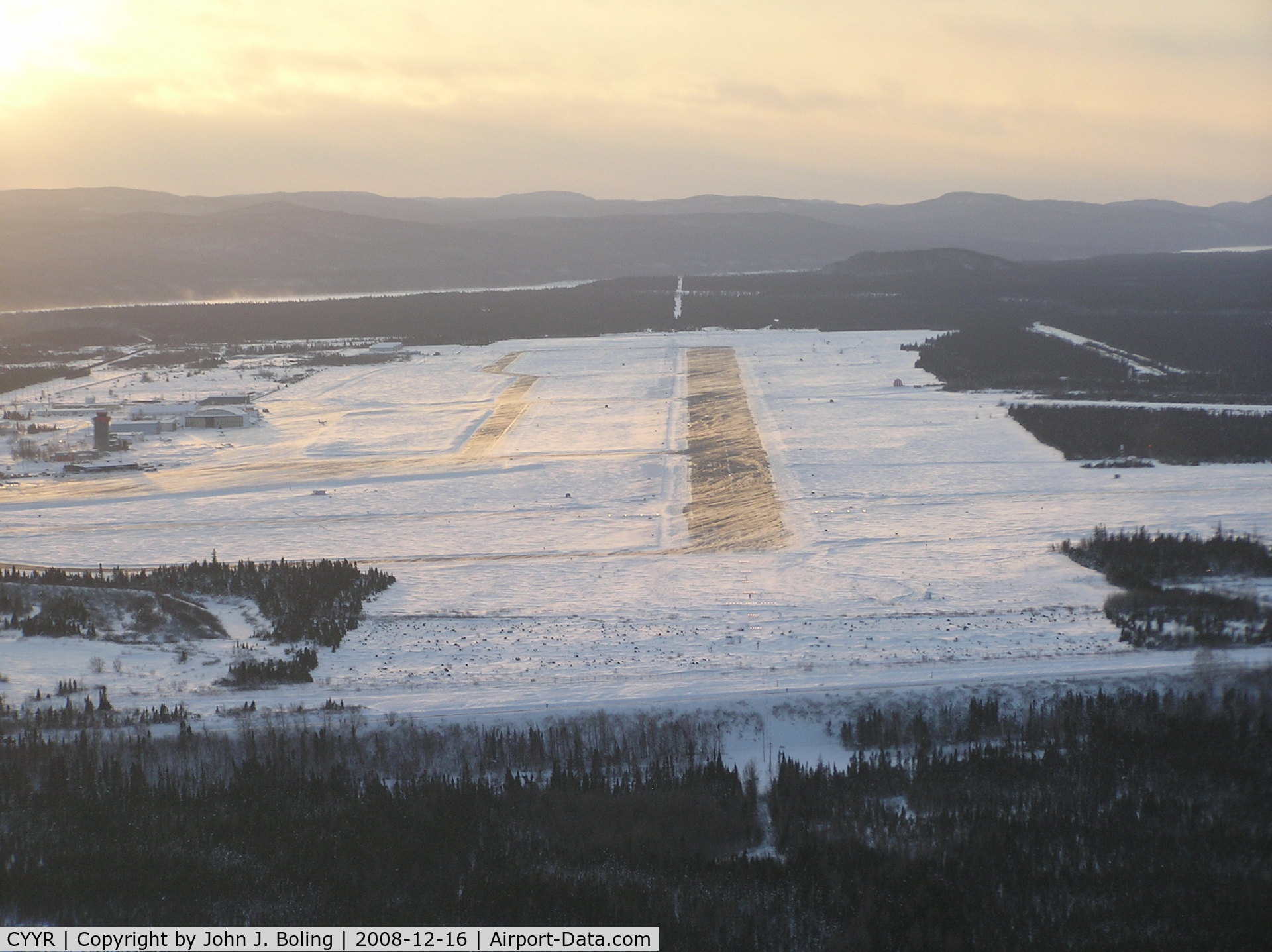 CFB Goose Bay (Goose Bay Airport), Happy Valley-Goose Bay, Newfoundland and Labrador Canada (CYYR) - Runway 26 at Goose Bay. Wind 300 at 18, gusts to 28, blowing snow.
