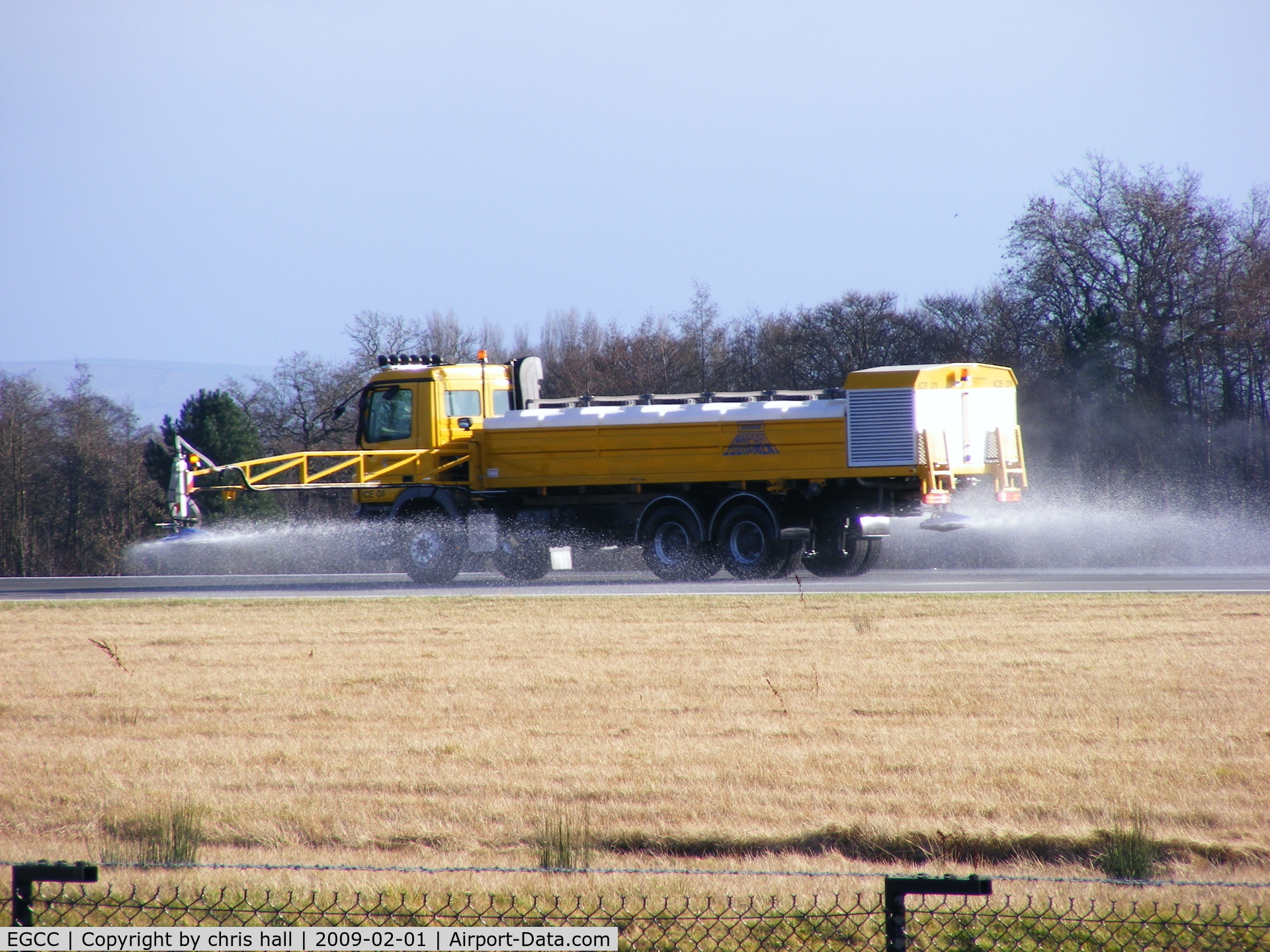 Manchester Airport, Manchester, England United Kingdom (EGCC) - Spraying deicer on the runway 