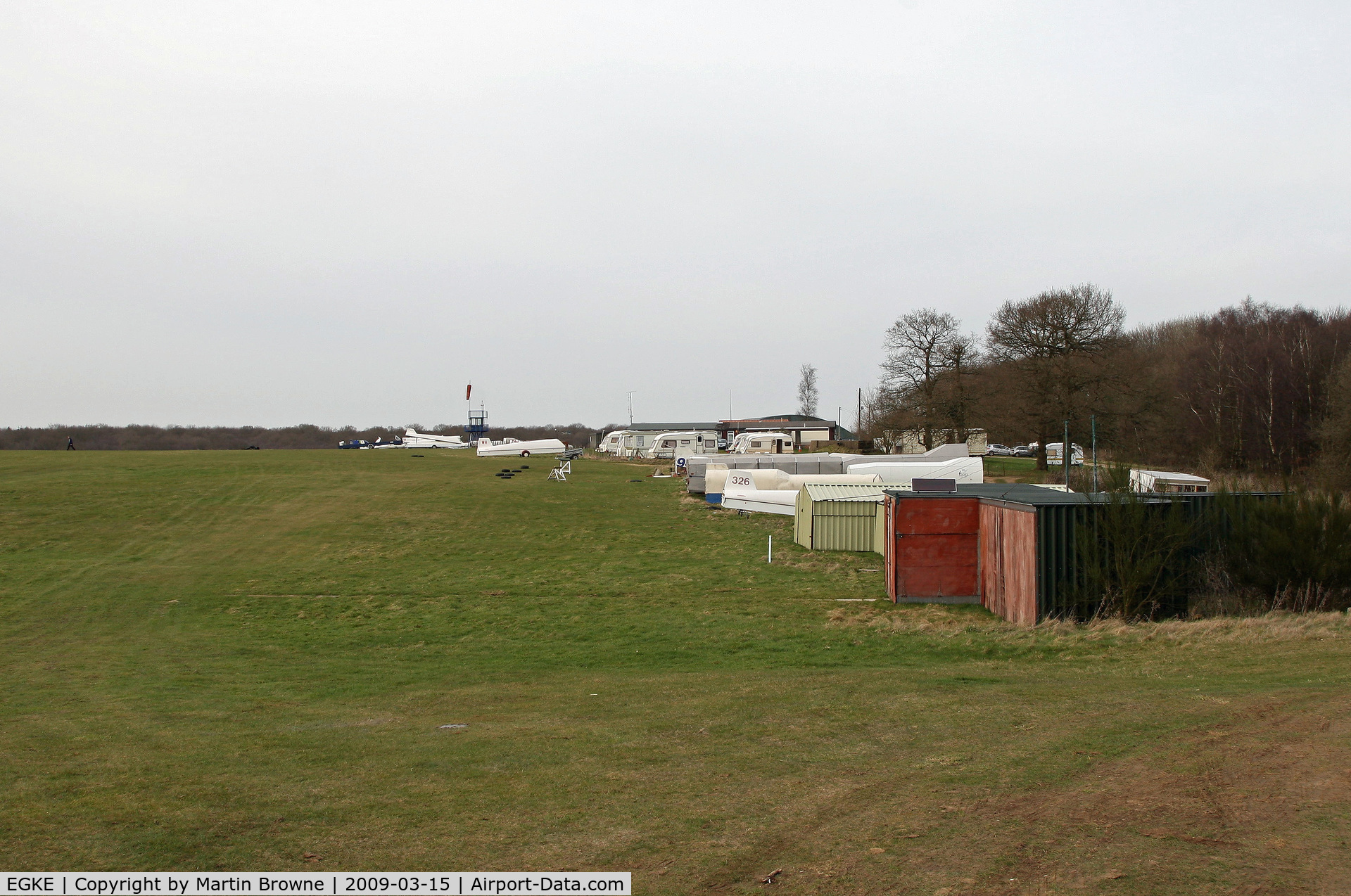 Challock Airport, Challock, England United Kingdom (EGKE) - Looking past the caravan park towards the admin buildings - from the motor glider hangar.