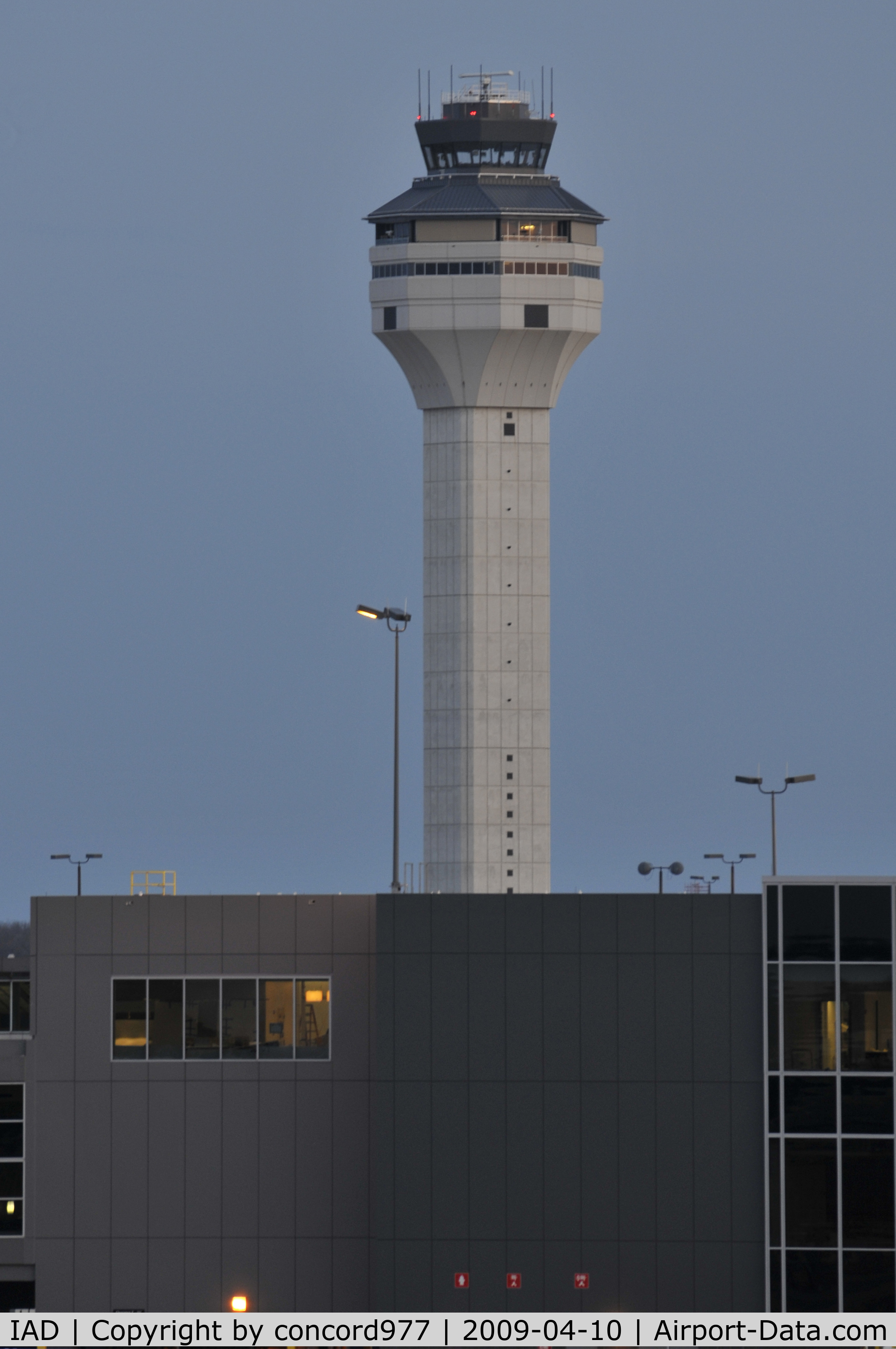 Washington Dulles International Airport (IAD) - The new tower lacks the elegance of the original terminal building and old tower.