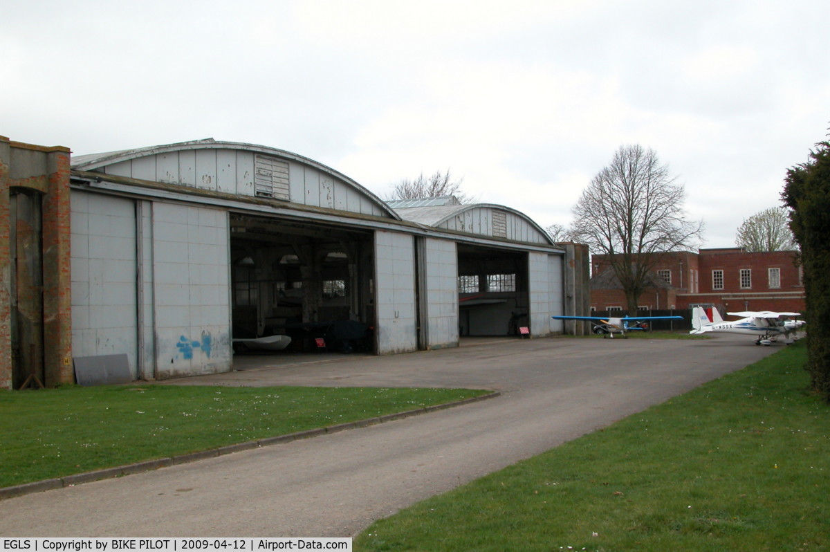 Old Sarum Airfield Airport, Salisbury, England United Kingdom (EGLS) - TWO OF THE FIRST WORLD WAR BELFAST HANGERS
