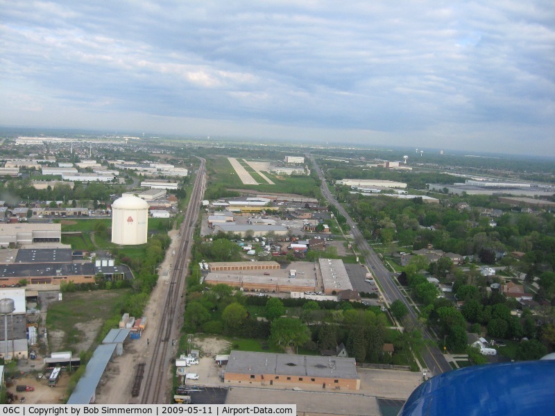 Schaumburg Regional Airport (06C) - Base-to-final for 29.  That's a big water tower.