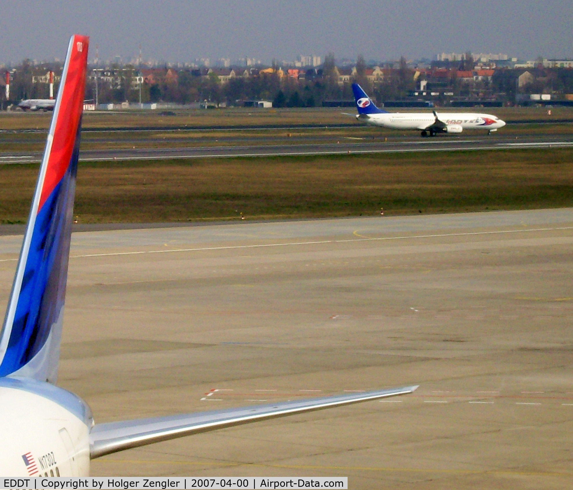 Tegel International Airport (closing in 2011), Berlin Germany (EDDT) - A moment of blue, red and white.