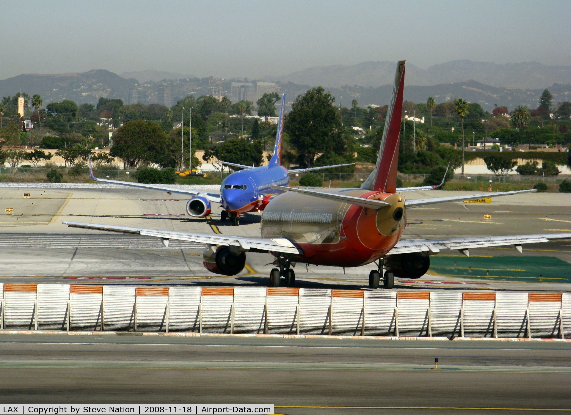 Los Angeles International Airport (LAX) - The old (N349SW) and the new (N907WN) face off for 