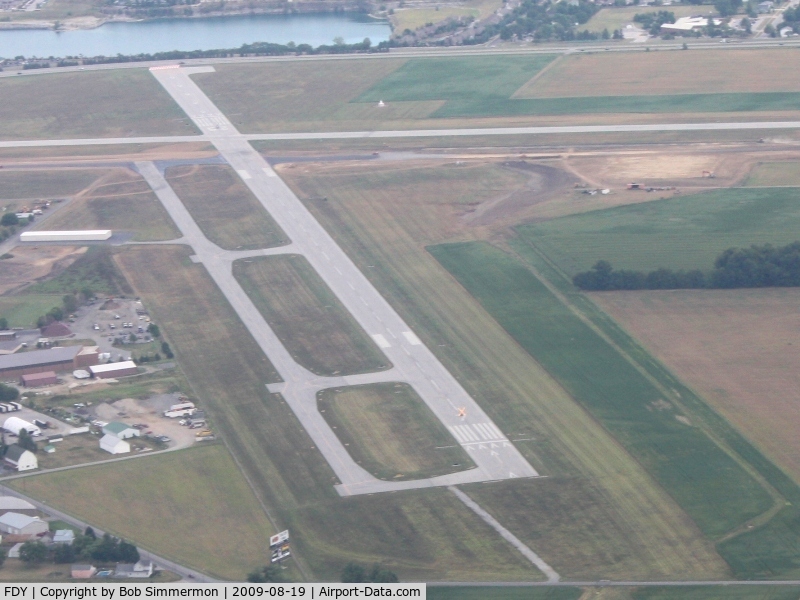Findlay Airport (FDY) - Looking east at the construction work.  Note the illuminated X on RWY 7