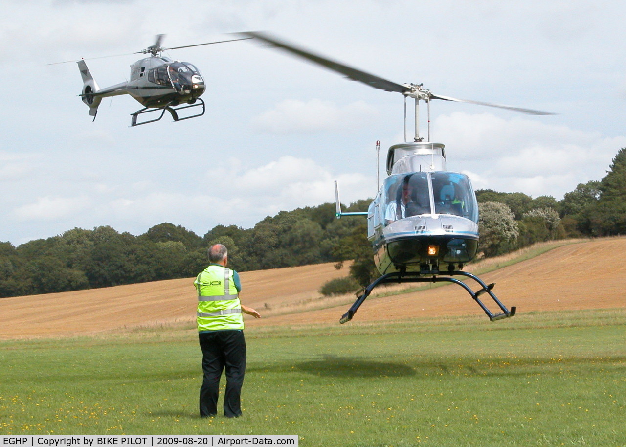 Popham Airfield Airport, Popham, England United Kingdom (EGHP) - STARLIGHT FOUNDATION DAY, THE HELICOPTERS WERE KEPT VERY BUSY 