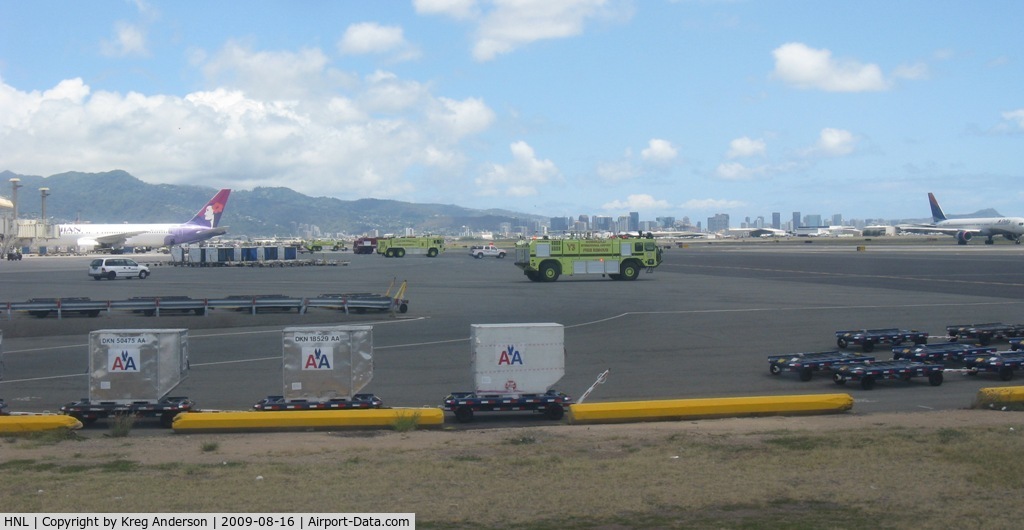 Honolulu International Airport (HNL) - The emergency vehicles lined up along the Ewa Concourse at HNL