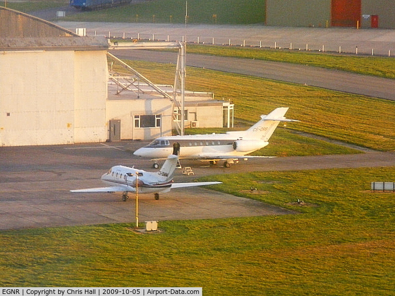 Hawarden Airport, Chester, England United Kingdom (EGNR) - CS-DMM and CS-DRB outside of the Hawker Beechcraft hangar as we arrive back at Hawarden